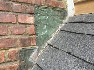 Norfolk, CT - Roof meets brick.